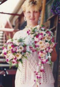 Here I am holding the first Bride and Bridesmaid Bouquets I ever made